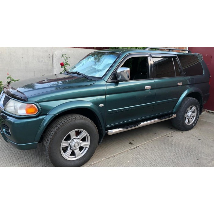 Пороги труба с накладками для Mitsubishi Pajero Sport 1998-2007